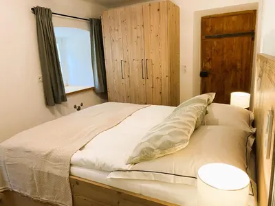 Ein Bett oder Betten in einem Zimmer der Unterkunft Mitteralm-Kreuth