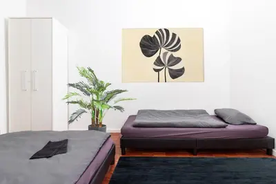 Ein Bett oder Betten in einem Zimmer der Unterkunft Nahe Olympiapark und Stadtzentrum, Wunderschönes Apartment