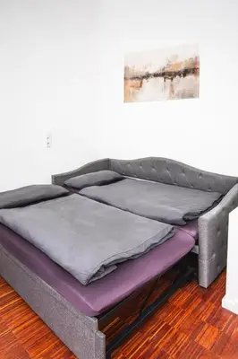 Ein Bett oder Betten in einem Zimmer der Unterkunft Nahe Olympiapark und Stadtzentrum, Wunderschönes Apartment