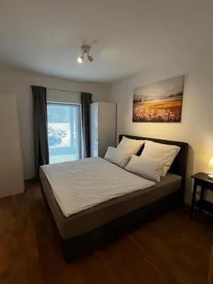 Ein Bett oder Betten in einem Zimmer der Unterkunft Ferienwohnung Rössler