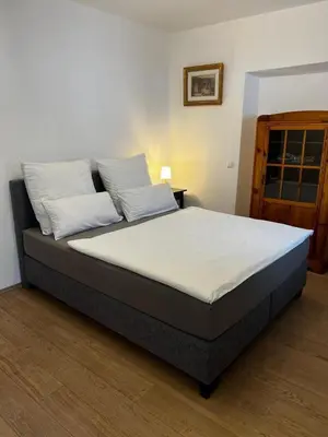 Ein Bett oder Betten in einem Zimmer der Unterkunft Ferienwohnung Rössler