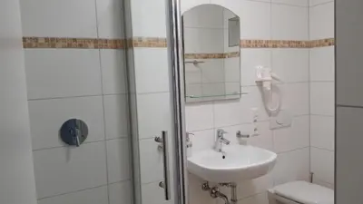Ein Badezimmer in der Unterkunft Schäfer Boardinghouse