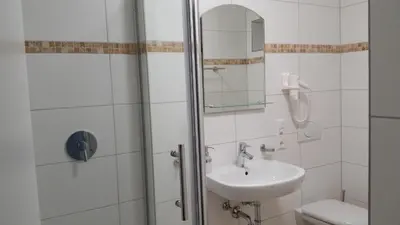 Ein Badezimmer in der Unterkunft Schäfer Boardinghouse
