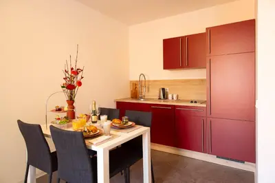 Küche/Küchenzeile in der Unterkunft Hotel & Boarding House Schlosserwirt