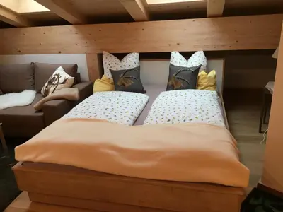 Ein Bett oder Betten in einem Zimmer der Unterkunft Ferienwohnung Ostermair Apartment Gudiberg