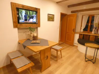 Ein Sitzbereich in der Unterkunft Apartments Donebauer