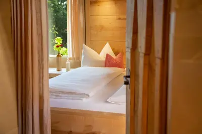 Ein Bett oder Betten in einem Zimmer der Unterkunft Turm zu Schloss Schedling