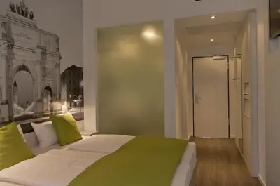 Ein Bett oder Betten in einem Zimmer der Unterkunft Super 8 by Wyndham Munich City North