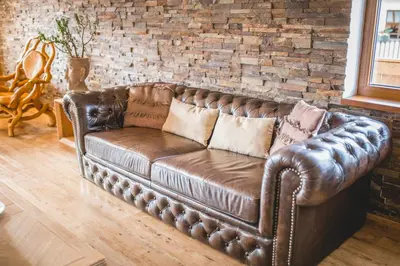 Ein Sitzbereich in der Unterkunft Downtown Suite Alpi