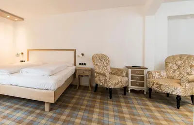 Ein Bett oder Betten in einem Zimmer der Unterkunft aussicht bio hotel restaurant cafe