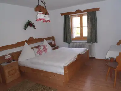 Ein Bett oder Betten in einem Zimmer der Unterkunft Ferienhaus Bergfreund