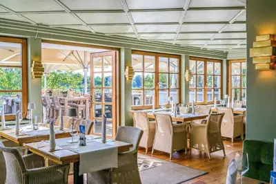 Ein Restaurant oder anderes Speiselokal in der Unterkunft Gasthof Rabenwirt