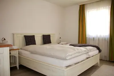 Ein Bett oder Betten in einem Zimmer der Unterkunft Gipfeltraum