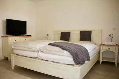 Ein Bett oder Betten in einem Zimmer der Unterkunft Gipfeltraum