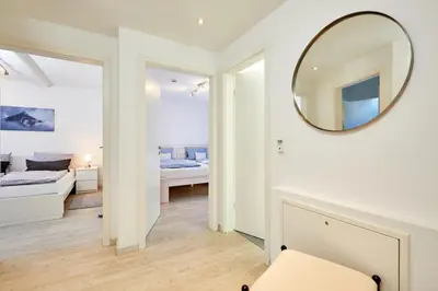 Ein Bett oder Betten in einem Zimmer der Unterkunft Ferienwohnung Alpspitze