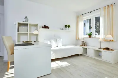 Ein Bett oder Betten in einem Zimmer der Unterkunft Ferienwohnung Alpspitze
