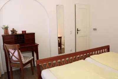 Ein Bett oder Betten in einem Zimmer der Unterkunft Ferienwohnung Zugspitze