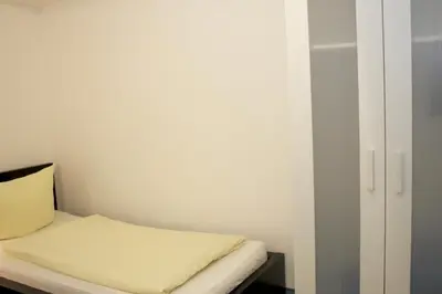 Ein Bett oder Betten in einem Zimmer der Unterkunft Ferienwohnung Zugspitze