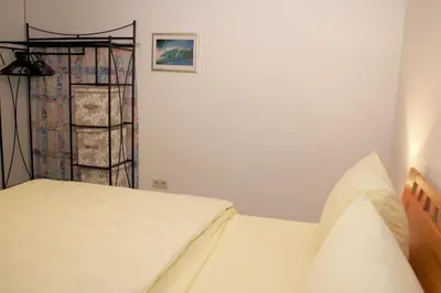 Ein Bett oder Betten in einem Zimmer der Unterkunft Ferienwohnung Zugspitze