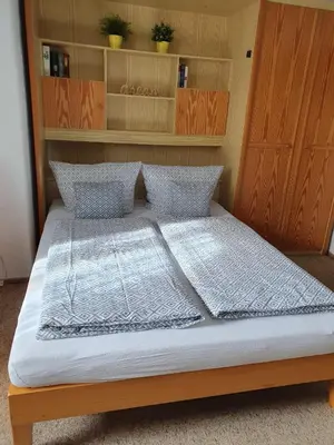Ein Bett oder Betten in einem Zimmer der Unterkunft FeWo Steckenbergblick/Gästecard
