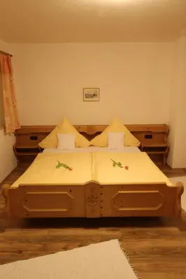 Ein Bett oder Betten in einem Zimmer der Unterkunft Ferienhaus Andreas