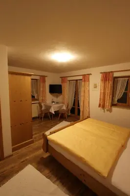 Ein Bett oder Betten in einem Zimmer der Unterkunft Ferienhaus Andreas