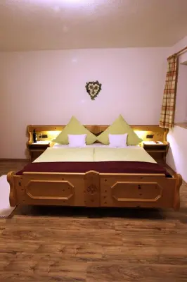 Ein Bett oder Betten in einem Zimmer der Unterkunft Ferienhaus Andreas