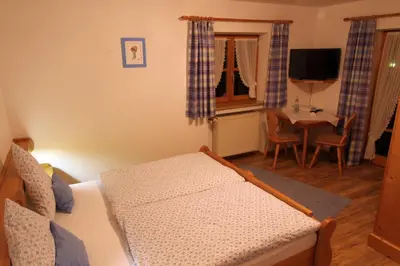 Ein Bett oder Betten in einem Zimmer der Unterkunft Ferienhaus Andreas