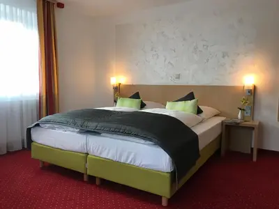 Ein Bett oder Betten in einem Zimmer der Unterkunft Waldgasthof St.Wolfgang