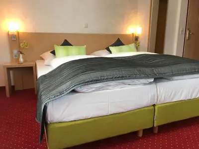 Ein Bett oder Betten in einem Zimmer der Unterkunft Waldgasthof St.Wolfgang