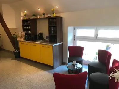 Ein Sitzbereich in der Unterkunft Waldgasthof St.Wolfgang