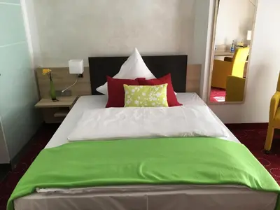 Ein Bett oder Betten in einem Zimmer der Unterkunft Waldgasthof St.Wolfgang