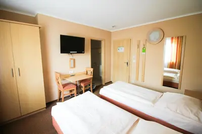 Ein Bett oder Betten in einem Zimmer der Unterkunft Jagerhof