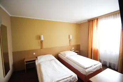 Ein Bett oder Betten in einem Zimmer der Unterkunft Jagerhof