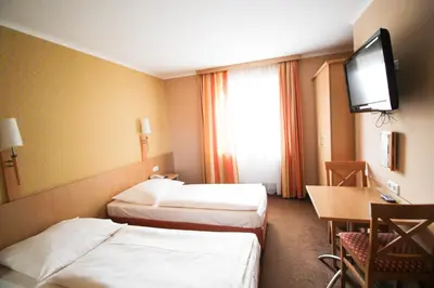 Ein Bett oder Betten in einem Zimmer der Unterkunft Jagerhof