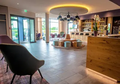 Ein Sitzbereich in der Unterkunft BEST WESTERN Hotel The K Unterföhring