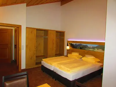 Ein Bett oder Betten in einem Zimmer der Unterkunft Gästehaus Gritscher