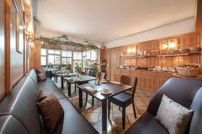 Ein Sitzbereich in der Unterkunft Hotel Eschenhof