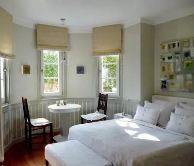 Ein Bett oder Betten in einem Zimmer der Unterkunft Am Eichholz Galerie & Art-Hotel