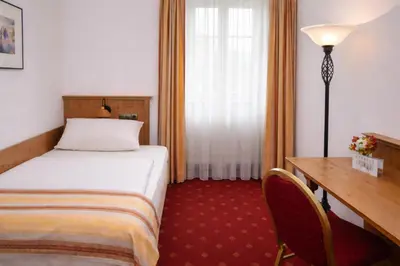 Ein Bett oder Betten in einem Zimmer der Unterkunft Gasthof Klement