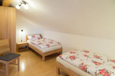 Ein Bett oder Betten in einem Zimmer der Unterkunft Ferienwohnung Rosalie