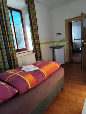 Ein Bett oder Betten in einem Zimmer der Unterkunft Mama Leone