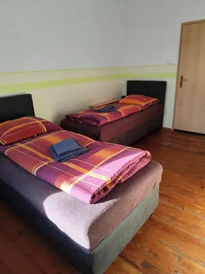 Ein Bett oder Betten in einem Zimmer der Unterkunft Mama Leone