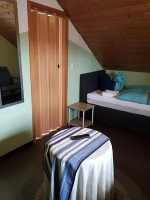 Ein Bett oder Betten in einem Zimmer der Unterkunft Mama Leone