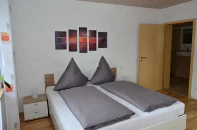 Ein Bett oder Betten in einem Zimmer der Unterkunft Ferienwohnung Gabler