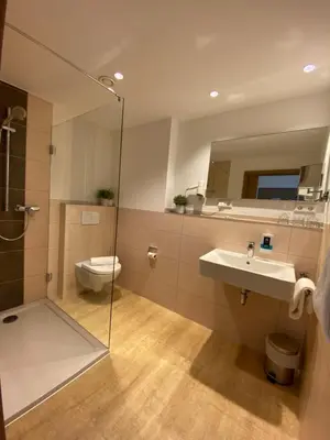 Ein Badezimmer in der Unterkunft Hotel Asgard