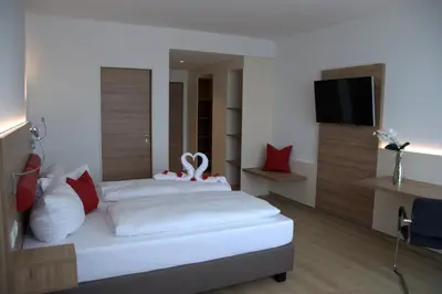 Ein Bett oder Betten in einem Zimmer der Unterkunft Hotel Asgard