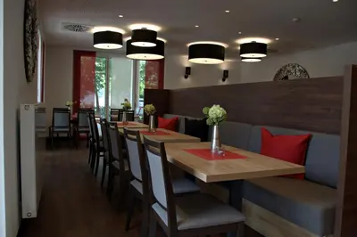 Ein Sitzbereich in der Unterkunft Hotel Asgard