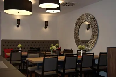 Ein Sitzbereich in der Unterkunft Hotel Asgard