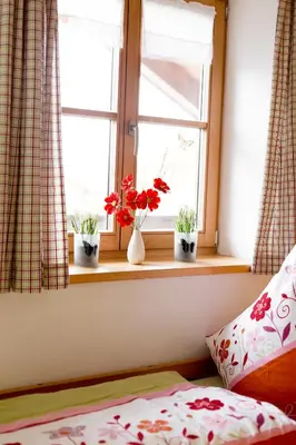 Ein Bett oder Betten in einem Zimmer der Unterkunft Ferienwohnung Erhard